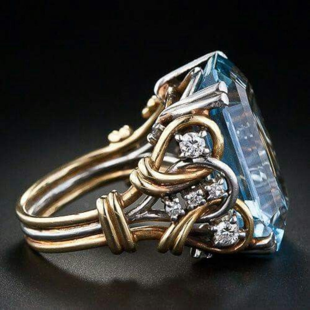 Vintage Goldring i lag med blå zirconia