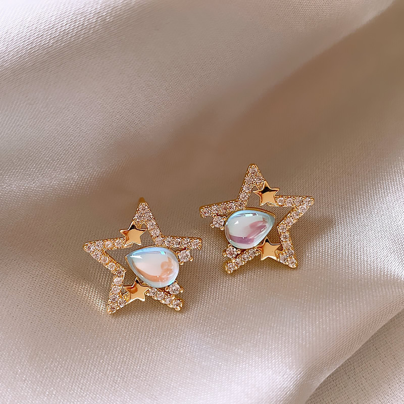 Elegante stjerneøreringe af diamanter