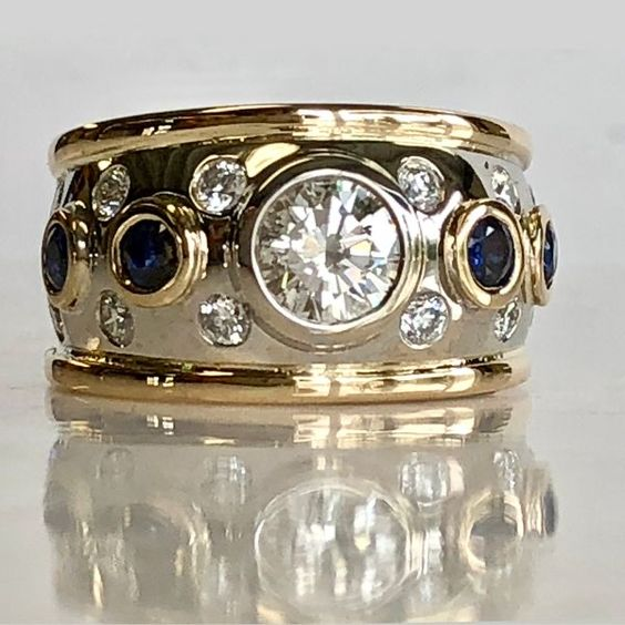 Ædel guld ring med zirkonia og blå krystaller
