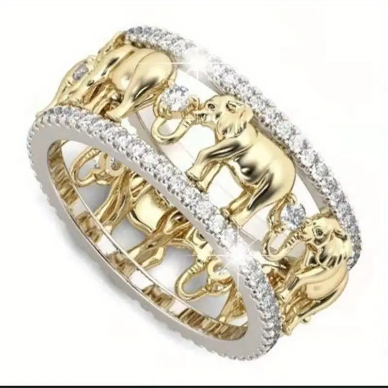 Guld ring med elefanter
