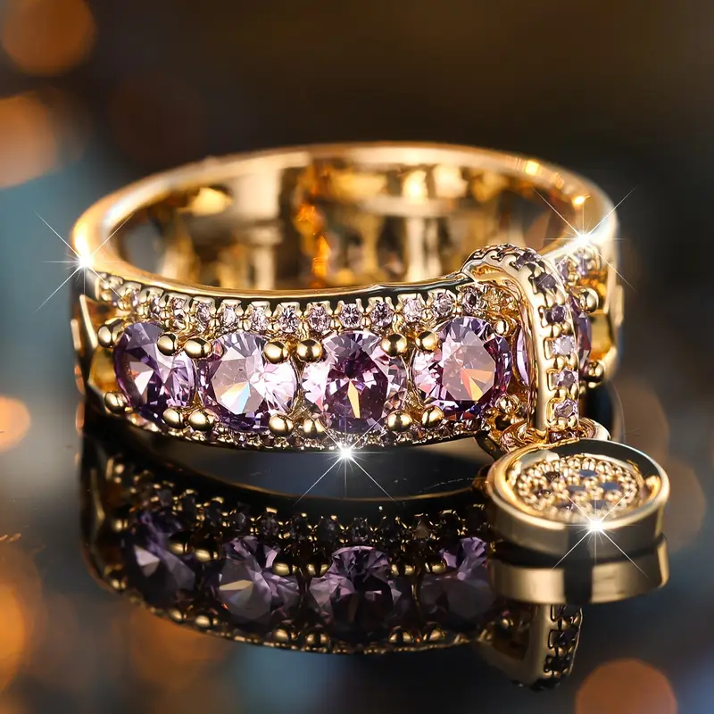 Guldring med charm og violet zirkonia