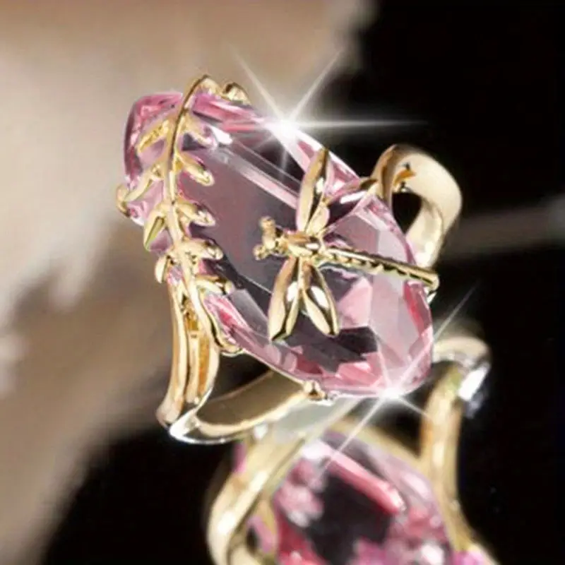 Ring med natur-elementer og rosa krystal