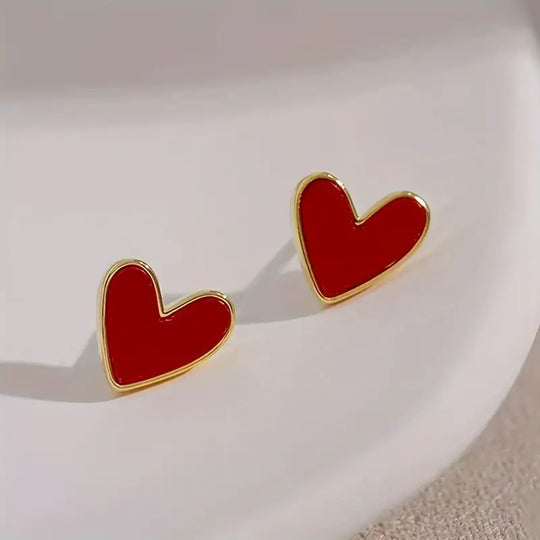 Mini delikate hjerteformede ørestikker